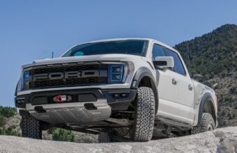 Ford Raptor on a rock front view