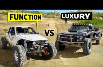 Two off-road trucks on a dirt track, one labeled function, the other labeled luxury, with rugged terrain in the background.