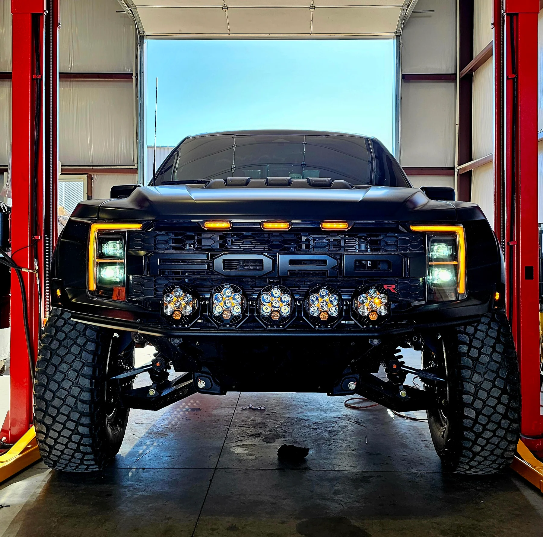 front view of ford raptor after install of svc off road mid travel kit